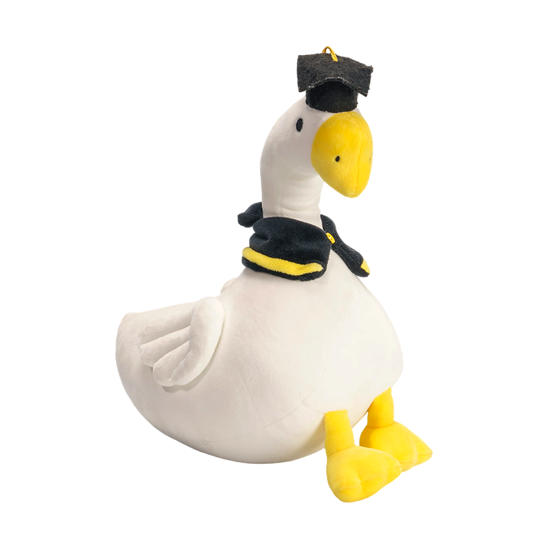 Peluches canard blanc en peluche avec casquette doctorale Peluches canard blanc en peluche avec casquette doctorale