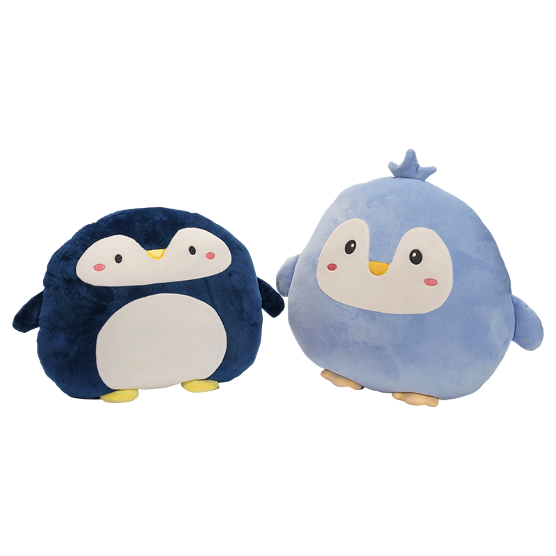 Oreillers moelleux en forme de pingouin